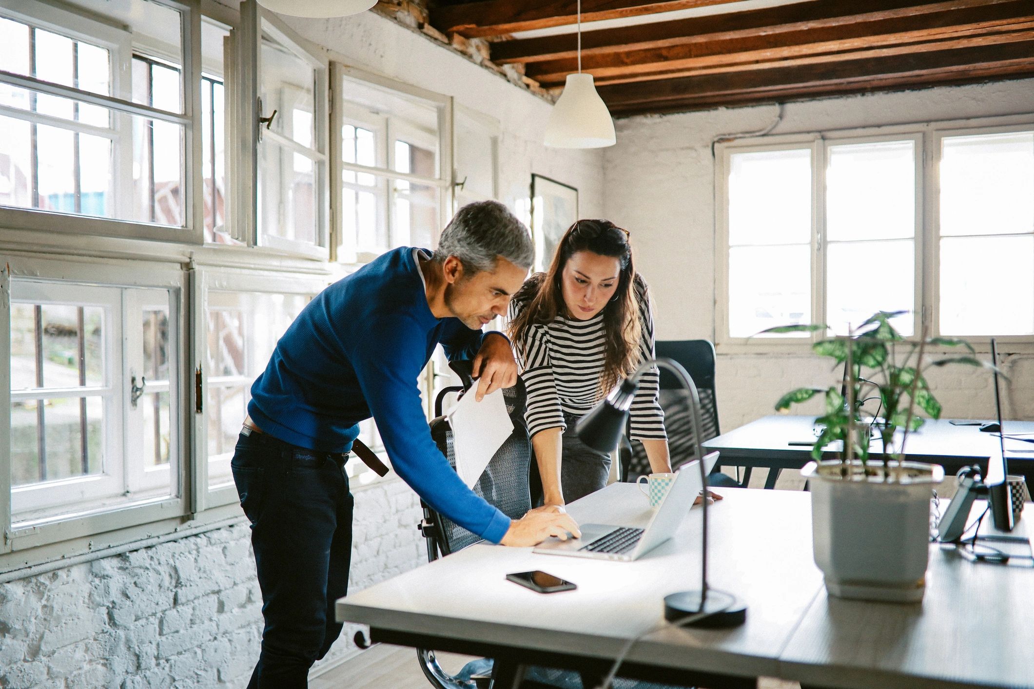 Marketing professional in a collaborative workspace
