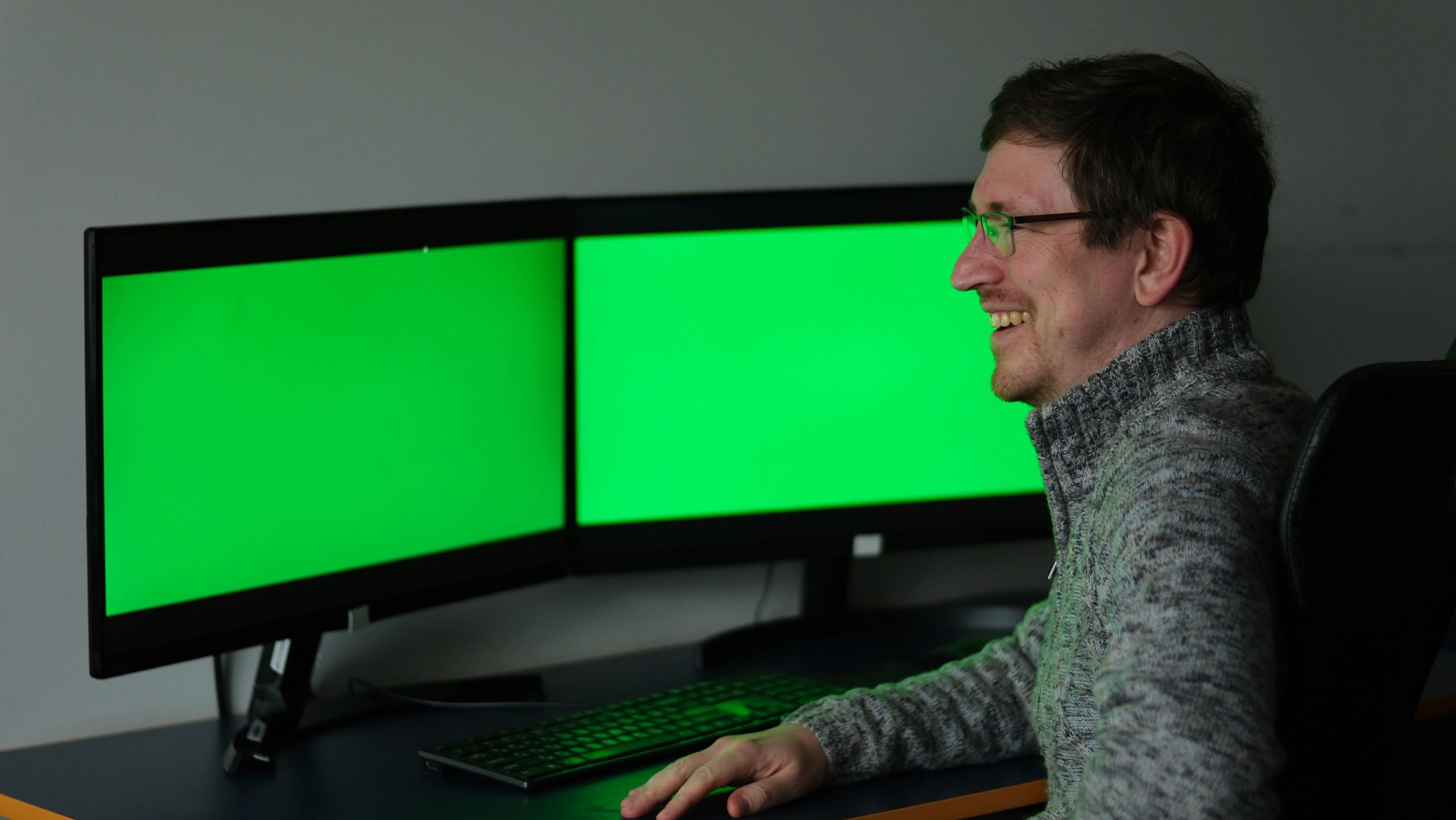 Creative professional working at a desktop in a modern office