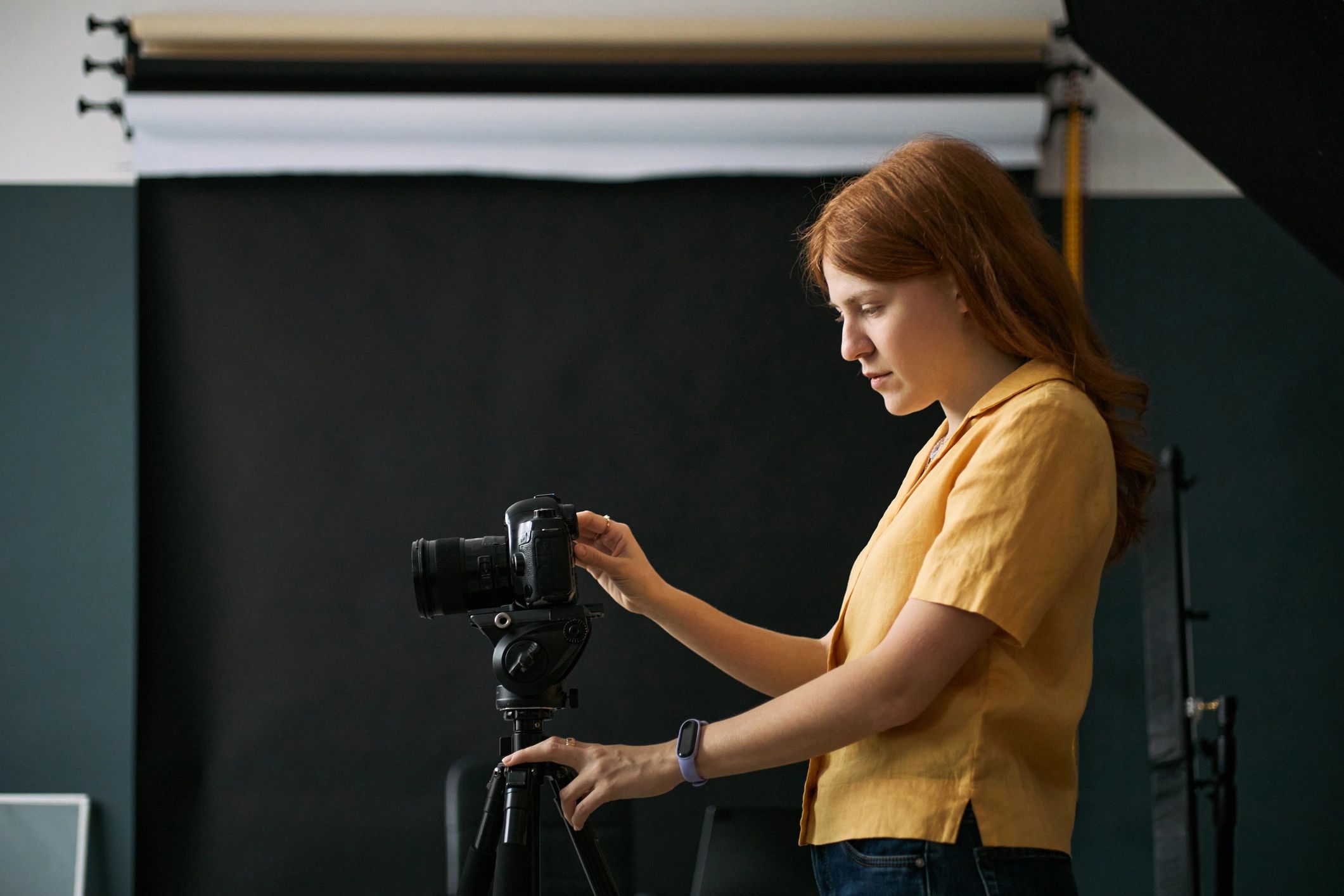Creator setting up camera for video production